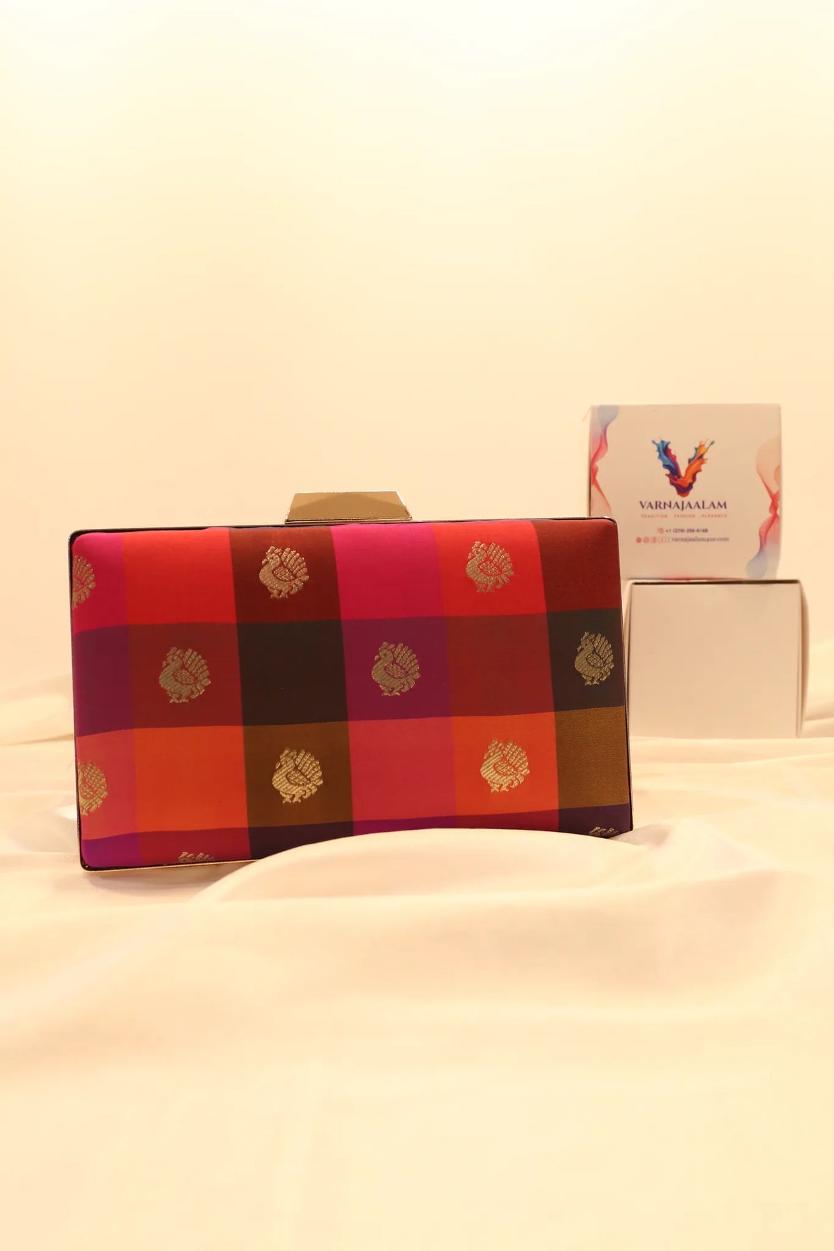 Silk-covered box clutch