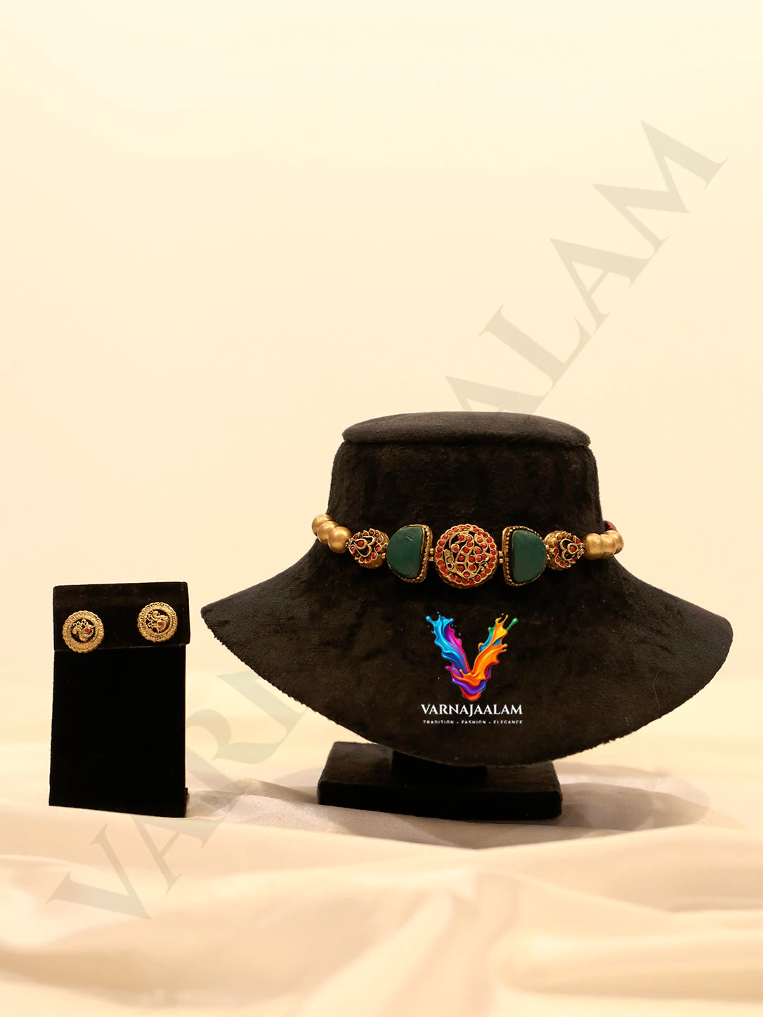 Handcrafted terracotta choker with green half-moon beads, red beaded central medallion, gold accents, and matching round stud earrings